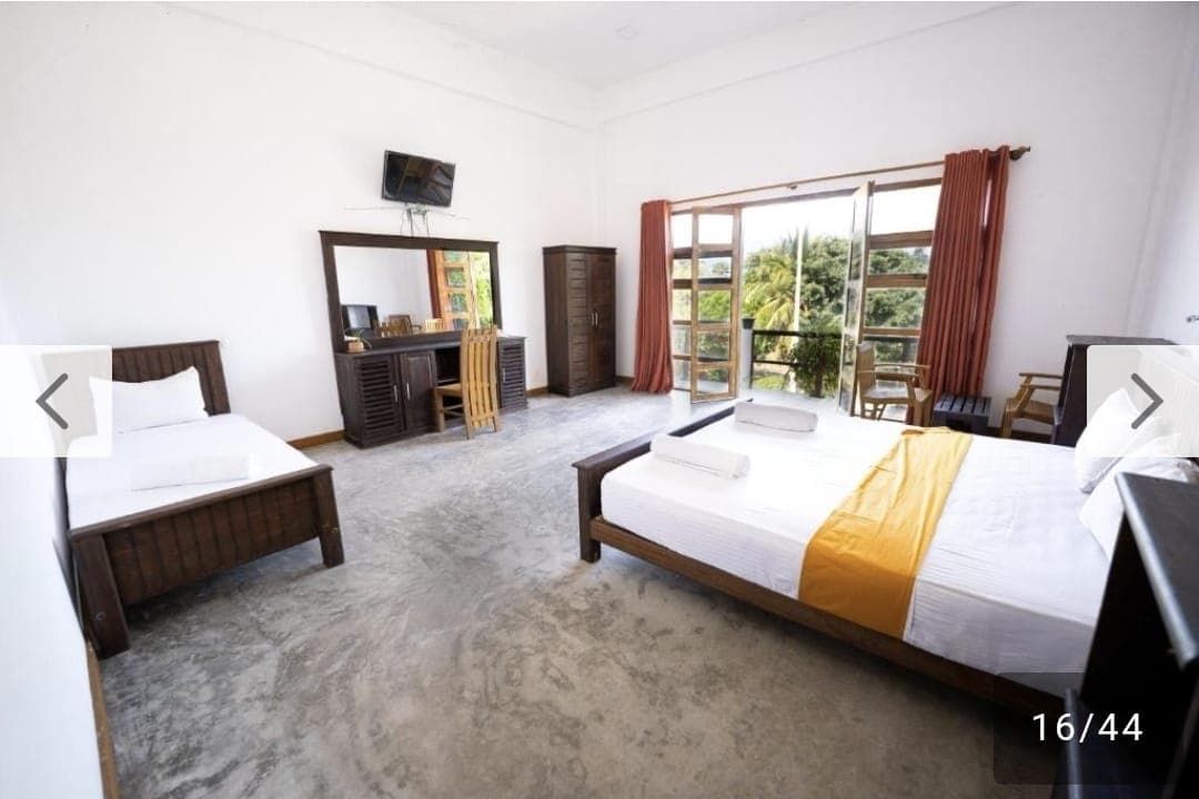 Spacious family room with double beds and balcony